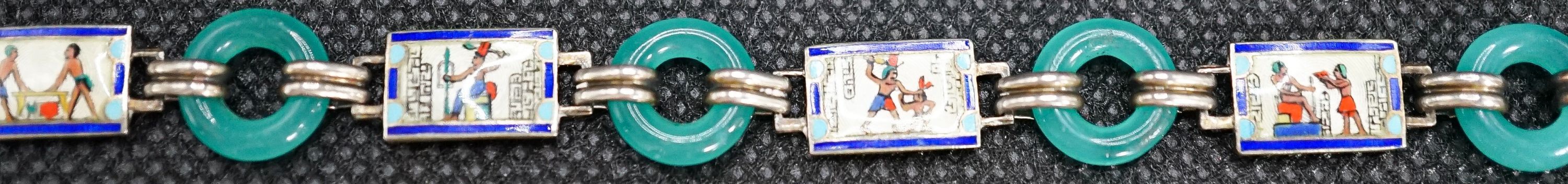 A 20th century Egyptianesque gilt white metal, enamel and chrysoprase loop set bracelet, 18cm.
